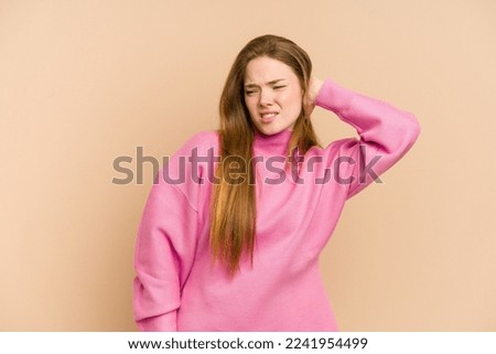 Young redhead woman cut out isolated tired and very sleepy keeping hand on head.