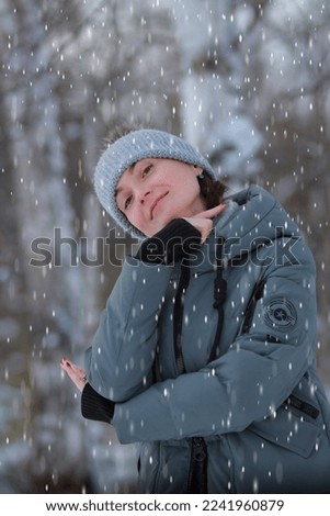 Portrait of a girl in a winter forest