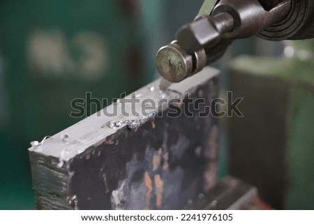 iron planer is working with turning knife