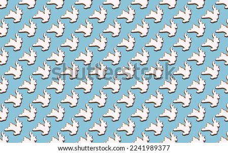 Seamless pattern of cookies in the shape of White deer, on a blue background, minimal print for new year card or wrapping paper. Happy new year and merry christmas concept