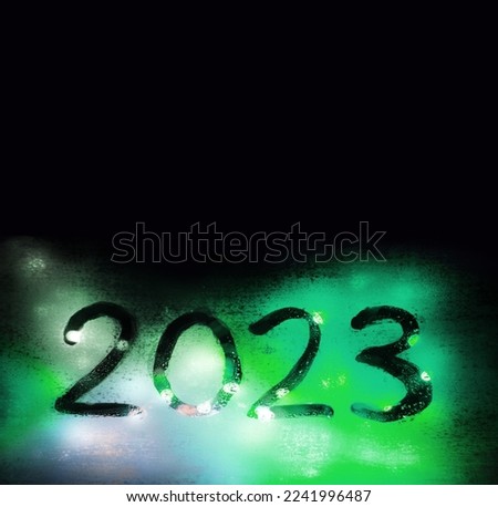 Closeup rainy freeze big view green color hand draw glare dot merry xmas party greet card de focus art soft time shape Cold frost rain city street car drawn eve fog spark flare flash text space letter