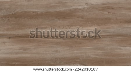 Plywood sheet surface of brown colour with wood pattern for background. Strong thin wooden board for construction or finishing and also use in ceramic wall and floor tiles