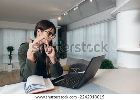 Young unemployed business woman economist banking expert preparing for job interview with human resource manager in bank. Freelancer girl reading and checking application statistic for job search. Royalty-Free Stock Photo #2242013015