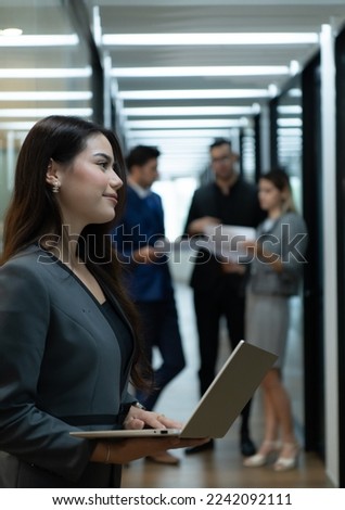 New business group person in the corridor of the conference room, Rehearse information to present results and new projects to the management team for consideration. Royalty-Free Stock Photo #2242092111