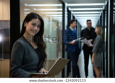 New business group person in the corridor of the conference room, Rehearse information to present results and new projects to the management team for consideration. Royalty-Free Stock Photo #2242092113