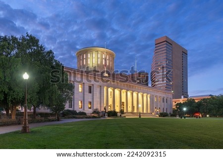 Columbus, Ohio, USA view of downtown and the statehouse from Capitol Squre at twilight.