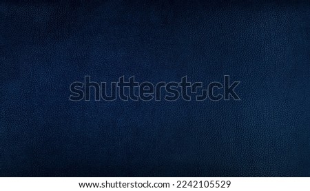dark blue genuine leather texture background for vintage, classic concept. blue background for decorations and textures. dark blue, navy color leather skin natural with design lines pattern. Royalty-Free Stock Photo #2242105529