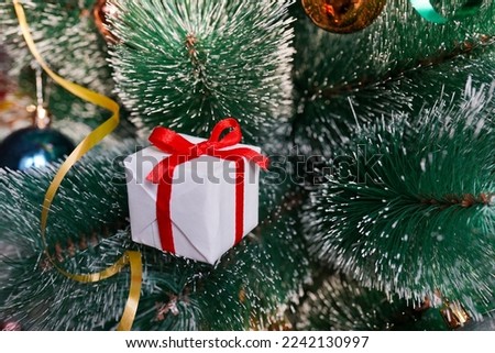 New Year white Gift Box or Christmas tree with gold Ribbon