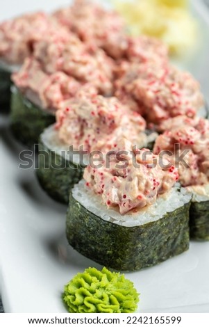 sushi roll tuna, Traditional rice combination, cucumber, cheese cream, spice tuna, Food recipe background. Close up,