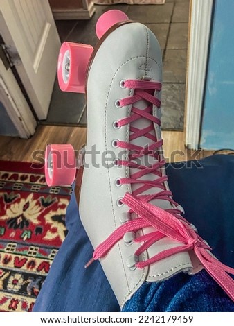 White skate with pink laces