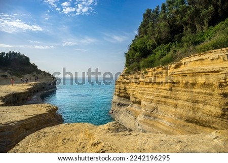 Beautiful landscape with cliffs popular Canal of Love (Canal d'Amour) on the island of Corfu, Greece. tourist attractions. amazing charming place. Royalty-Free Stock Photo #2242196295
