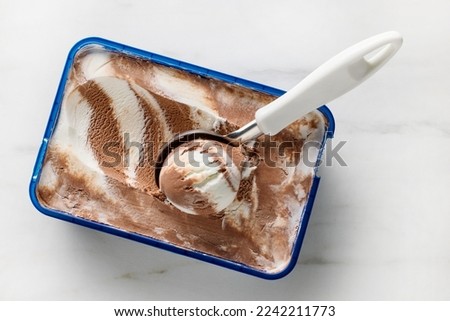 box of vanilla and chocolate ice cream, top view