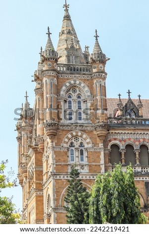 The Chhatrapati Shivaji Terminus in Mumbai, is an outstanding example of Victorian Gothic Revival architecture in India, blended with themes deriving from Indian traditional architecture. Royalty-Free Stock Photo #2242219421