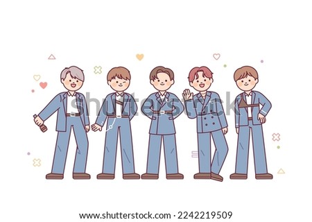 Cute male idol group. The boys are wearing stage costumes and greeting the fans. Royalty-Free Stock Photo #2242219509