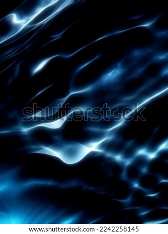 The​ metal​ texture​ of​ surface​ blue​ water​ reflected​ by​ sunlight​ for​ background. Blue​ water​ texture​ in​ the deep​ sea​ for​ background. Reflection​ on​ surface​ blue​ water. Blue​ water