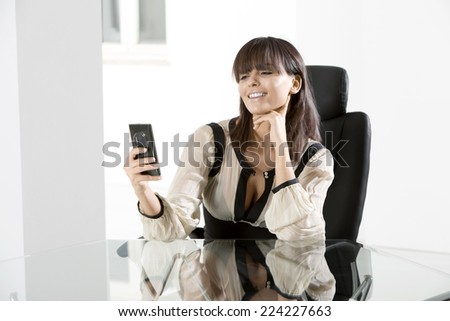 Young businesswoman at office