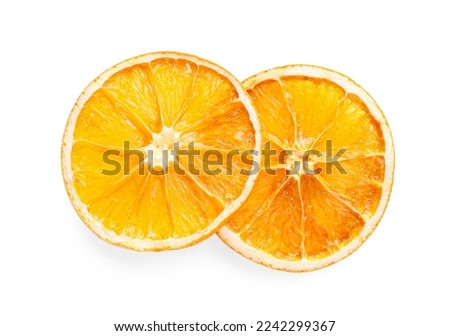 Delicious dry orange slices on white background, top view Royalty-Free Stock Photo #2242299367