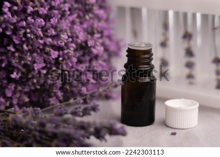 In laboratory, natural organic extraction and lavender flower herb aroma essence in test tube. Research and develop project medicine for health and beauty care. Copy space Royalty-Free Stock Photo #2242303113