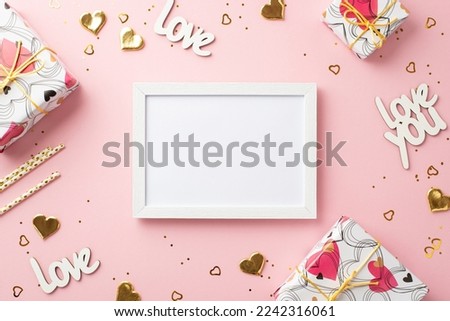 Valentine's Day concept. Top view photo of photo frame present boxes golden heart shaped confetti inscriptions love you straws and sequins on isolated pastel pink background with copyspace