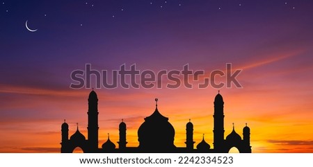 Silhouette Mosque dome against colorful Dusk sky and Crescent moon with stars in the evening Twilight, background design for Iftar period during Ramadan Holy month
