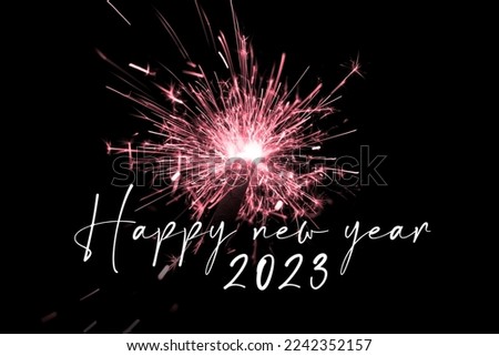 Happy new year 2023 red sparkler new years eve countdown. Luxury entertainment celebration turn of the year party time. Premium nightlife visual with glowing light sparks on dark background