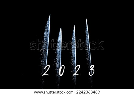 Happy new year 2023 blue fireworks rockets new years eve. Luxury firework event sky show turn of the year celebration. Holidays season party time. Premium entertainment nightlife background