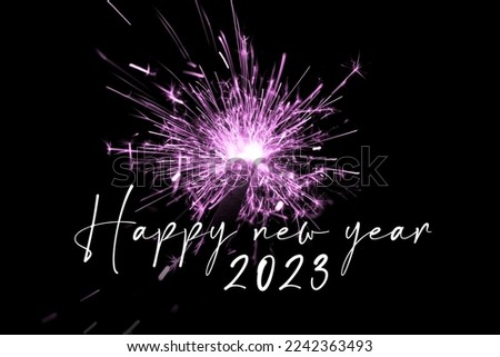 Happy new year 2023 pink sparkler new years eve countdown. Luxury entertainment celebration turn of the year party time. Premium nightlife visual with glowing light sparks on dark background