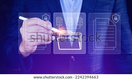 Document Management System (DMS) being setup IT consultant working on laptop computer in office. Software for archiving, searching and managing corporate files information Royalty-Free Stock Photo #2242394663