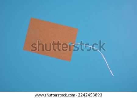 blank  card  gift tag isolated on a blue background