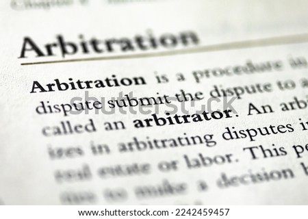 arbitration and Arbitrator written in business ethics textbook on United States law Royalty-Free Stock Photo #2242459457