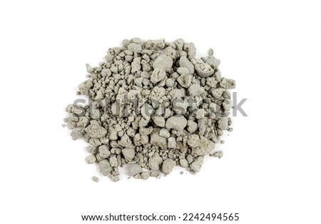 Pile of crushed green clay on a white background