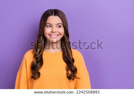 Photo of adorable pretty lady wear nice trendy autumn clothes look empty space interesting ad banner isolated on purple color background Royalty-Free Stock Photo #2242508881