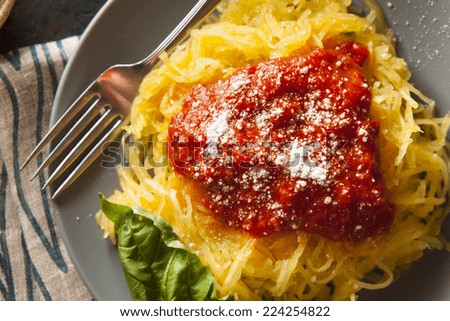 Homemade Cooked Spaghetti Squash Pasta with Marinara Sauce Royalty-Free Stock Photo #224254822
