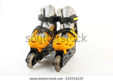 Yellow & Black Colored roller skates isolated on white 