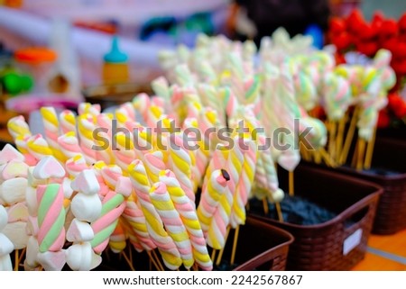 Neatly arranged sweet candy in the street food.