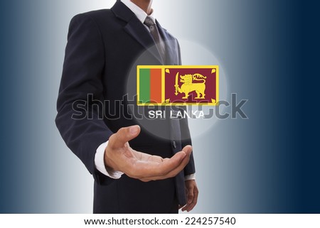 Businessman hand showing Sri Lanka Flag 
