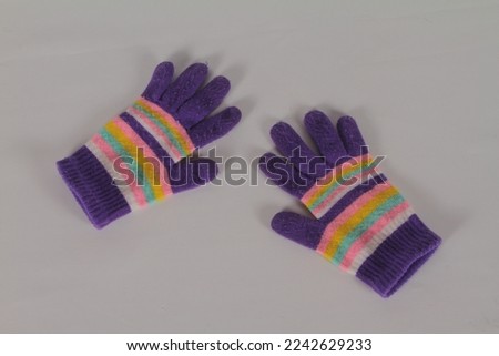 a pair of matching purple gloves