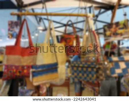 Blurred image of the atmosphere of the flea market in the mall.