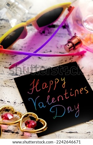 Note  Happy Valentines Day , card for Valentines Day on table, Art scratch paper for message. Teenager style
