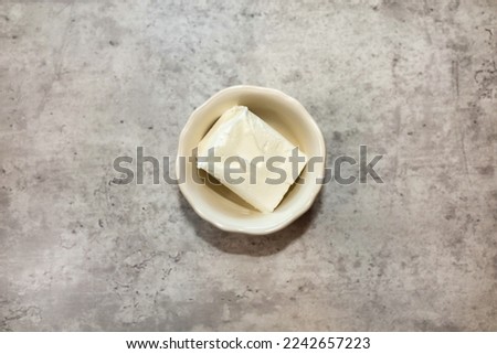 One half cup of vegetable shortening in a small bowl.