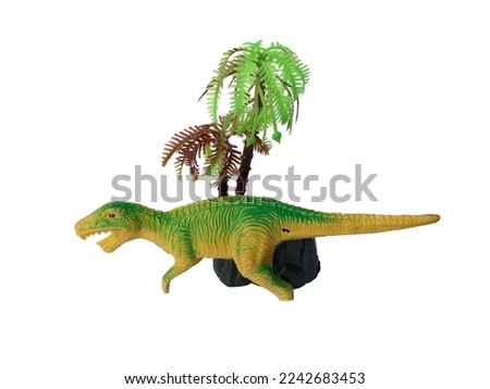 plastic T-rex toy isolated on white background