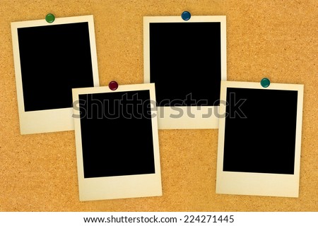 Retro photo cards on wood background