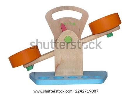 Children's toy wooden scales on a white background, isolate.