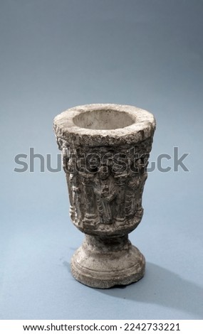 religion stone chalice on sky background, space for text Royalty-Free Stock Photo #2242733221