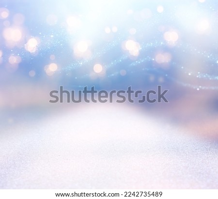 background of abstract gold, pink, purple and silver glitter lights. defocused