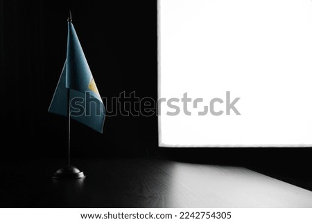 Small national flag of the Saint Lucia on a black background.