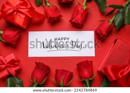 Card with text HAPPY VALENTINE'S DAY, gifts and roses on red background Royalty-Free Stock Photo #2242784869