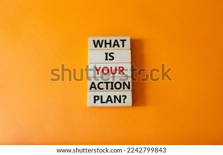 What is your action plan symbol. Wooden blocks with words What is your action plan. Beautiful orange background. Business and What is your action plan concept. Copy space