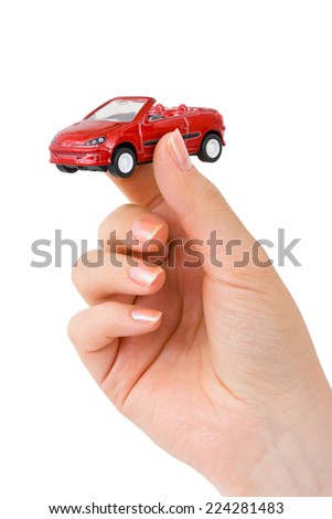 Hand and toy car isolated on white background