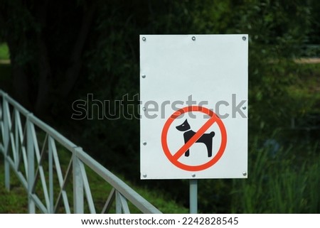 No dog walking sign, dogs are not allowed to walk in the park, prohibition sign for pets.